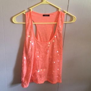 Orange top with sequins